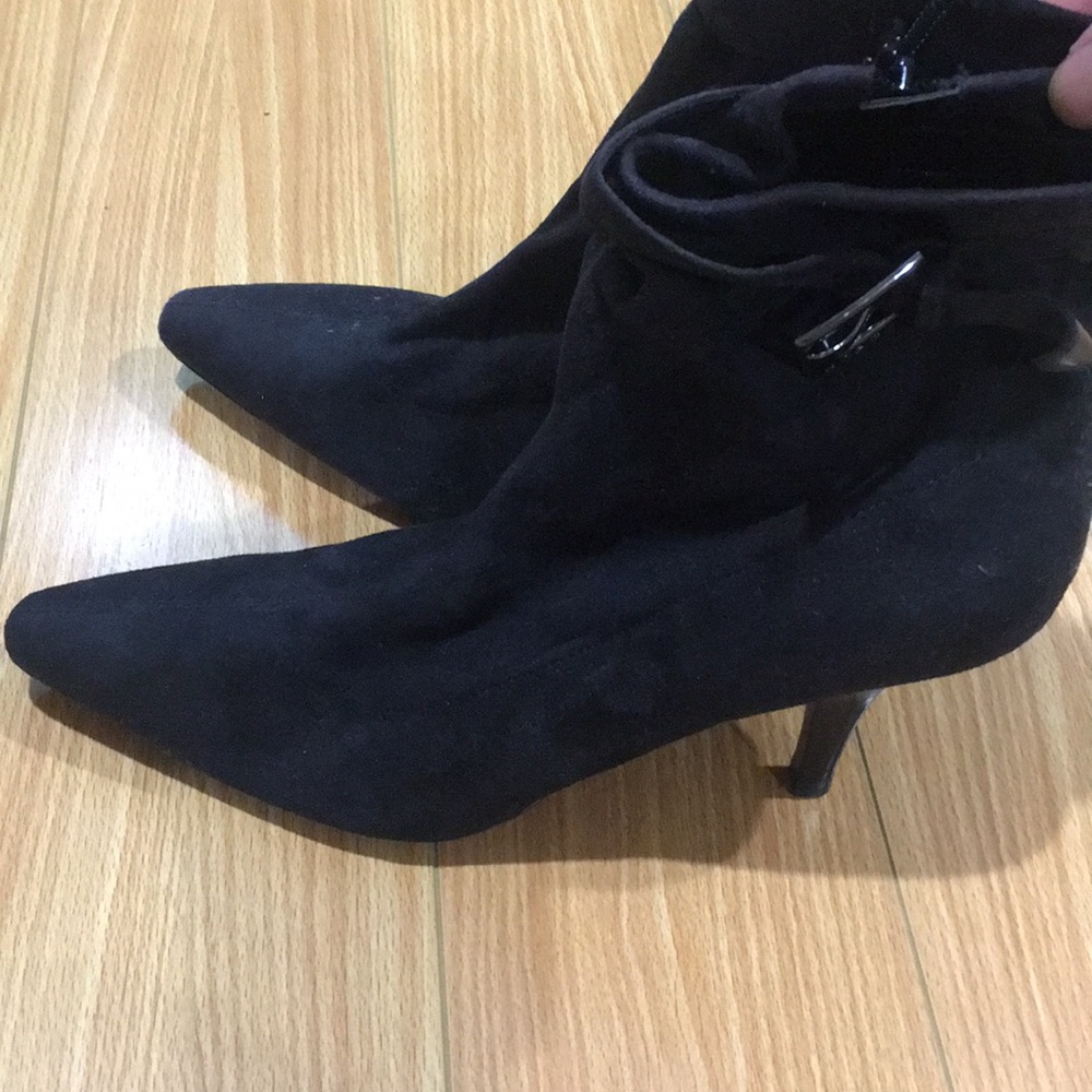 Suede heeled boots.